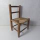 Old wooden straw chair for children
