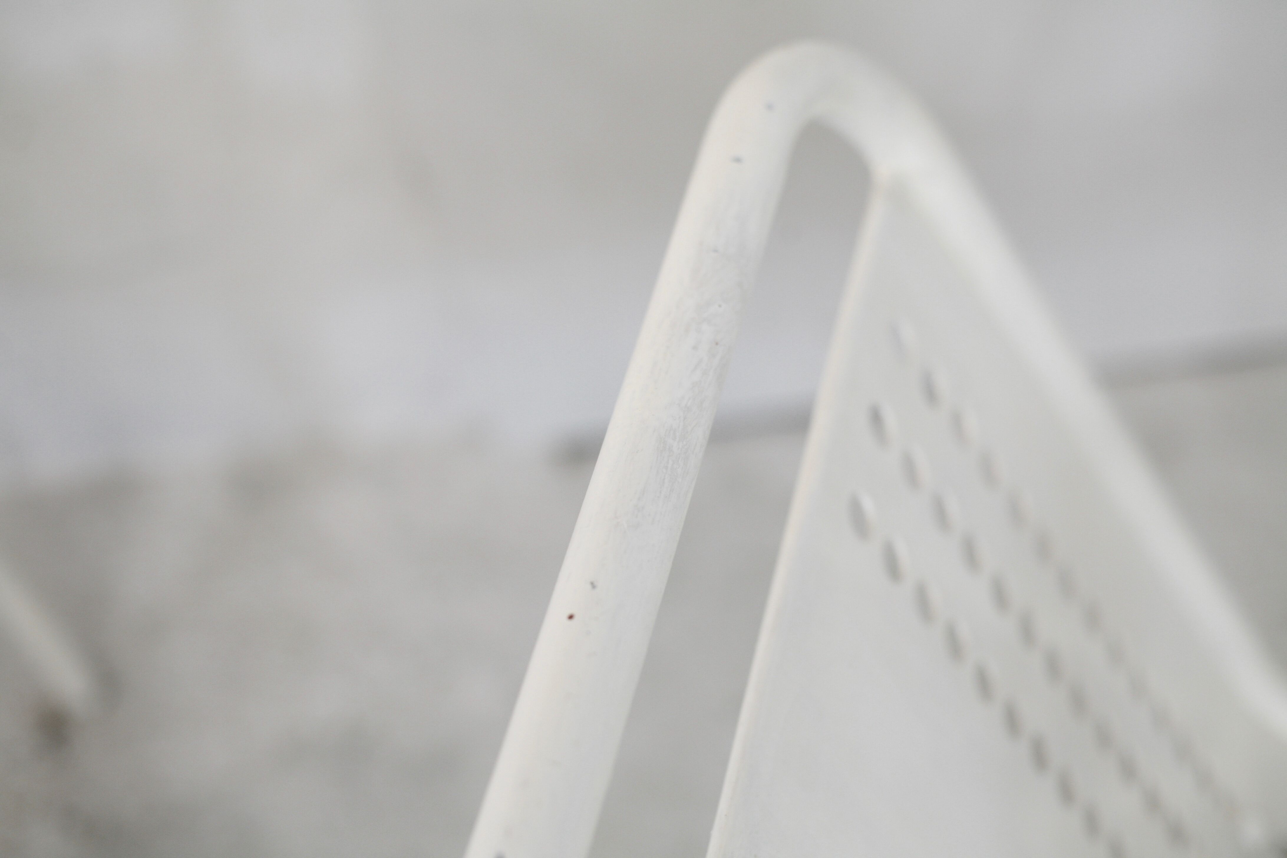 Pair of honeycomb steel armchairs. France, circa 1950.