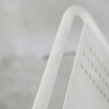 Pair of honeycomb steel armchairs. France, circa 1950.