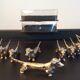 Series of 12 vintage dachshund knife holders in silver metal