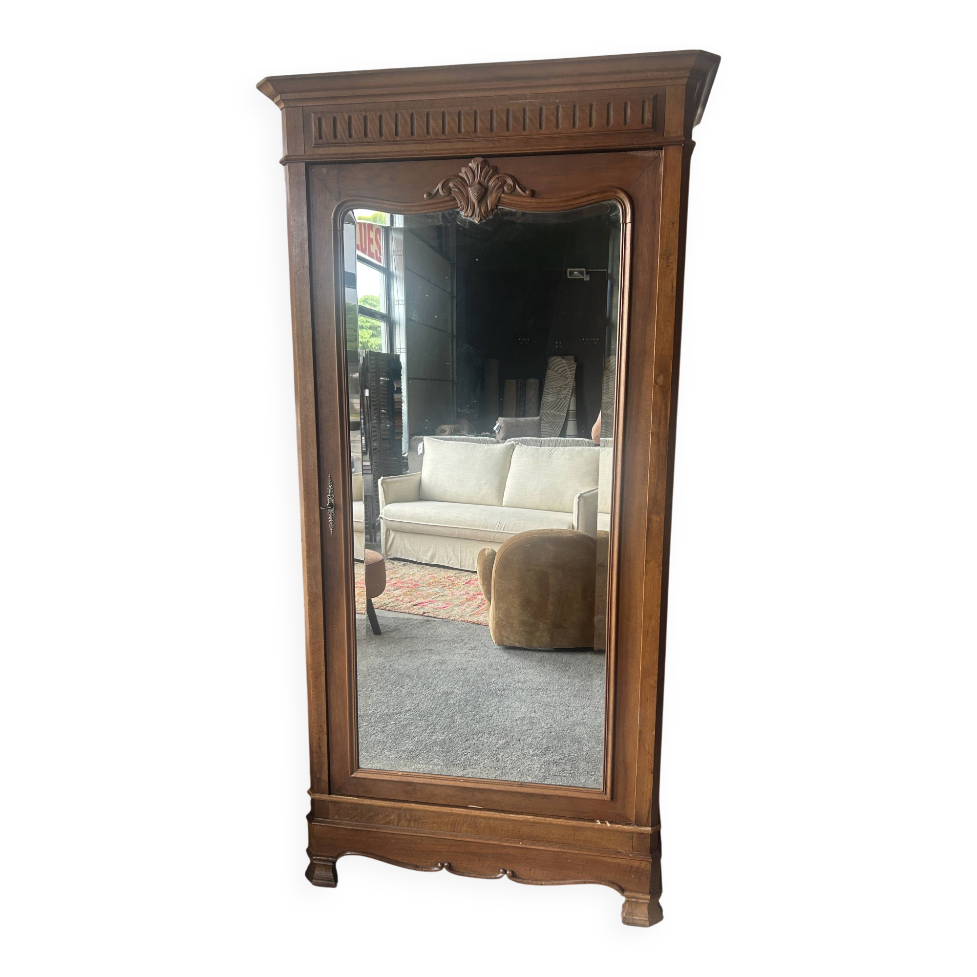 Antique Louis-Philippe walnut veneered wardrobe with an antique mirror.