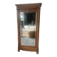 Antique Louis-Philippe walnut veneered wardrobe with an antique mirror.