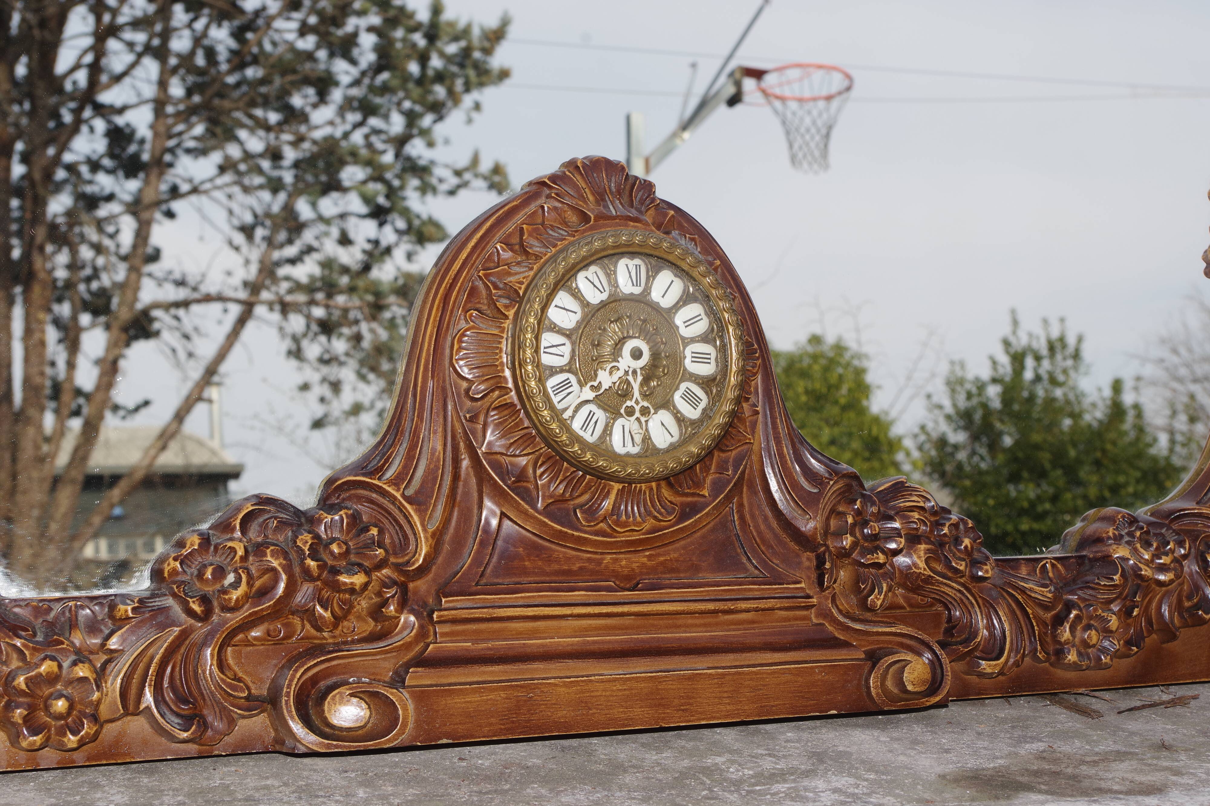 Wooden mirror with clock, 1960