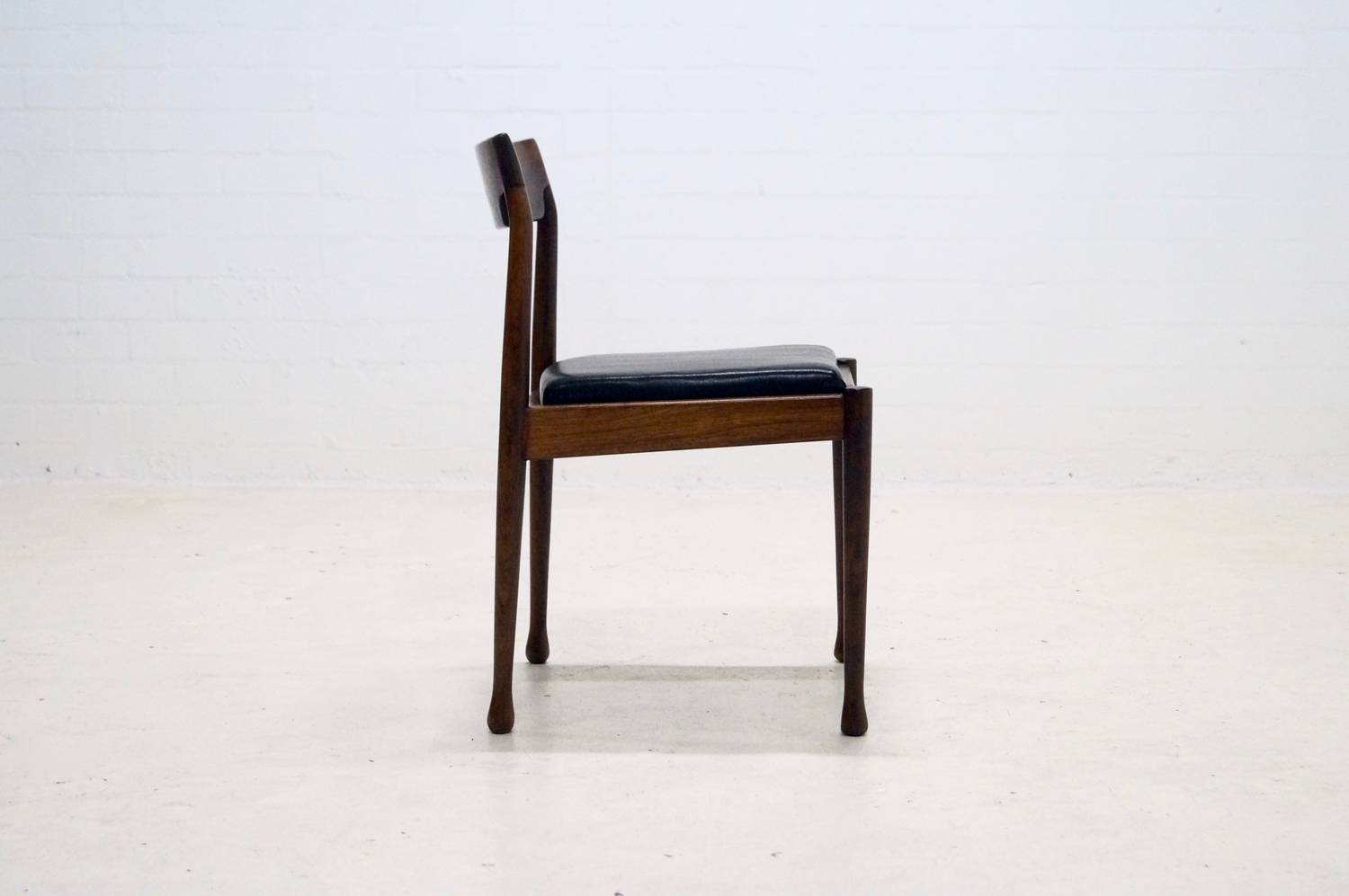 Chair in rosewood and skai 1960