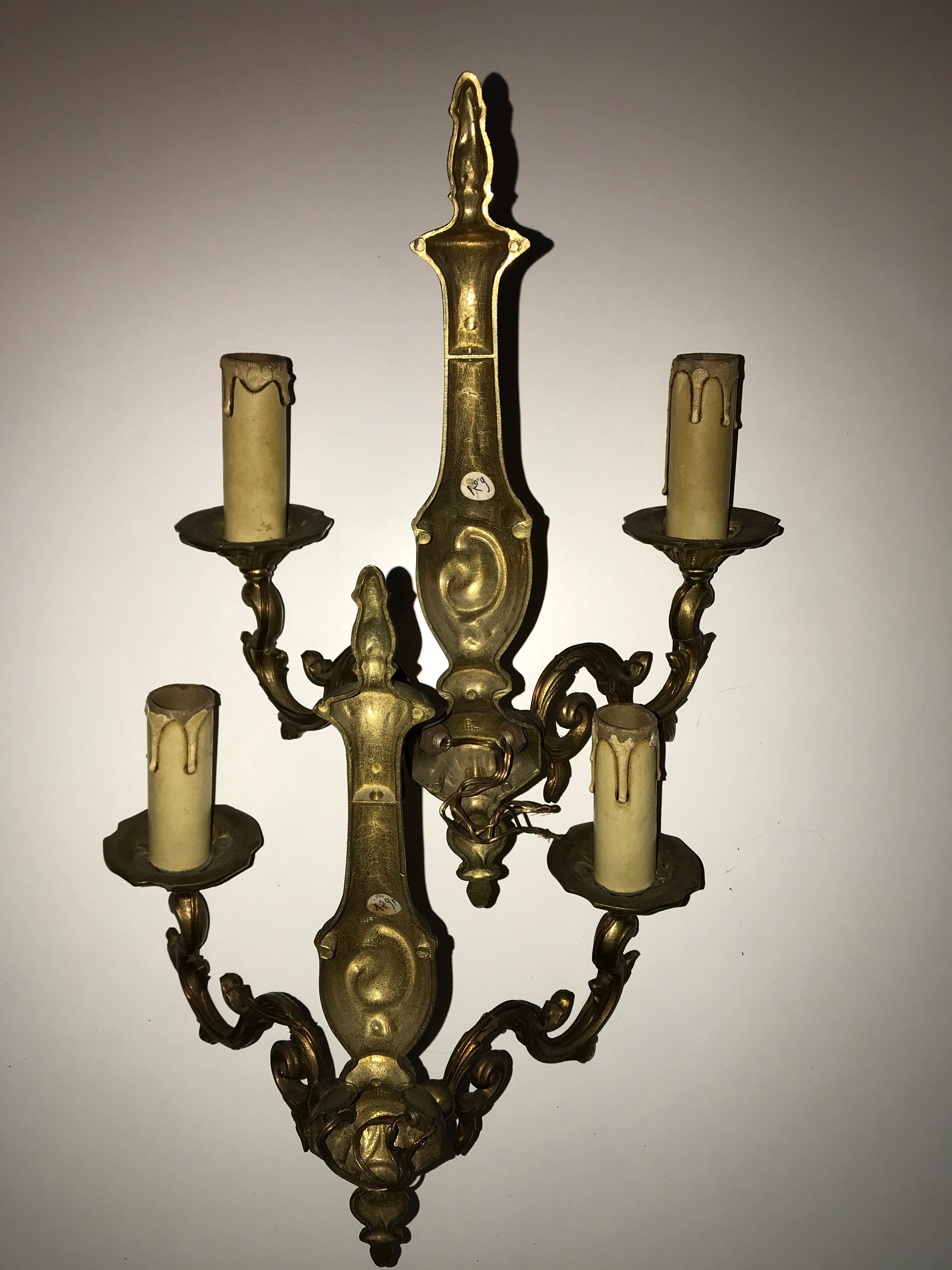 Pair of Louis XV style bronze wall sconces