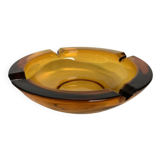 Large empty thick glass ashtray pocket