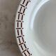 Presentation plate with a brown pattern