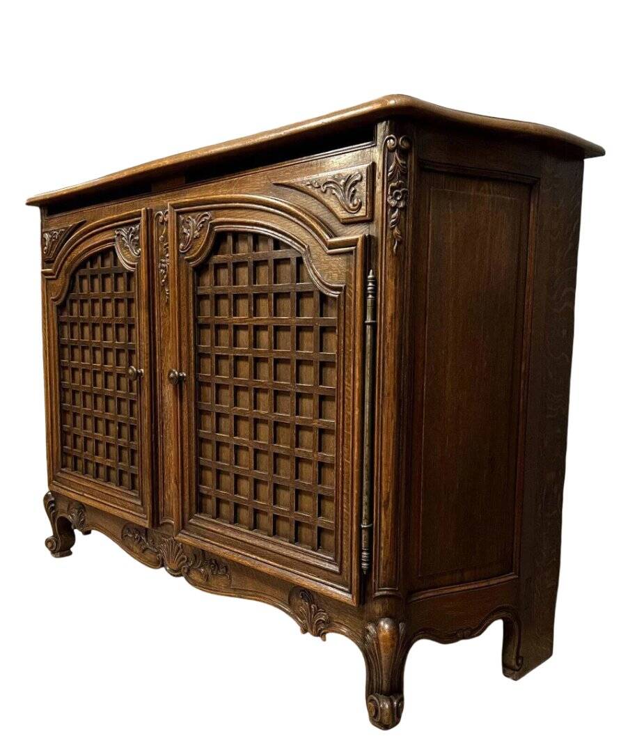 curved wooden buffet with double secret compartment in Louis XV style made of oak
