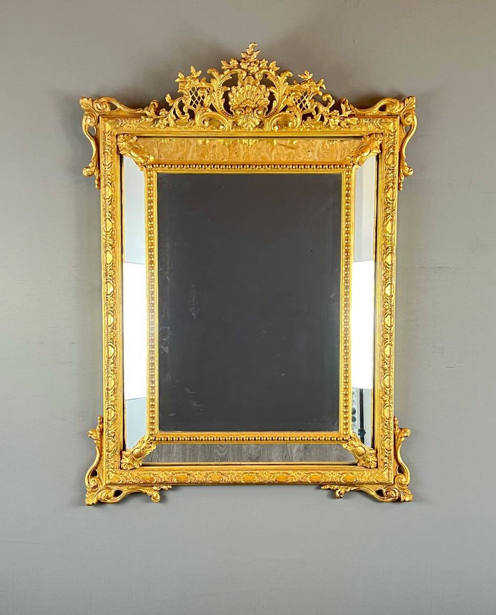 Large giltwood pediment mirror, 19th century