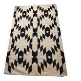 Wool kilim rug with geometric patterns – black & ecru