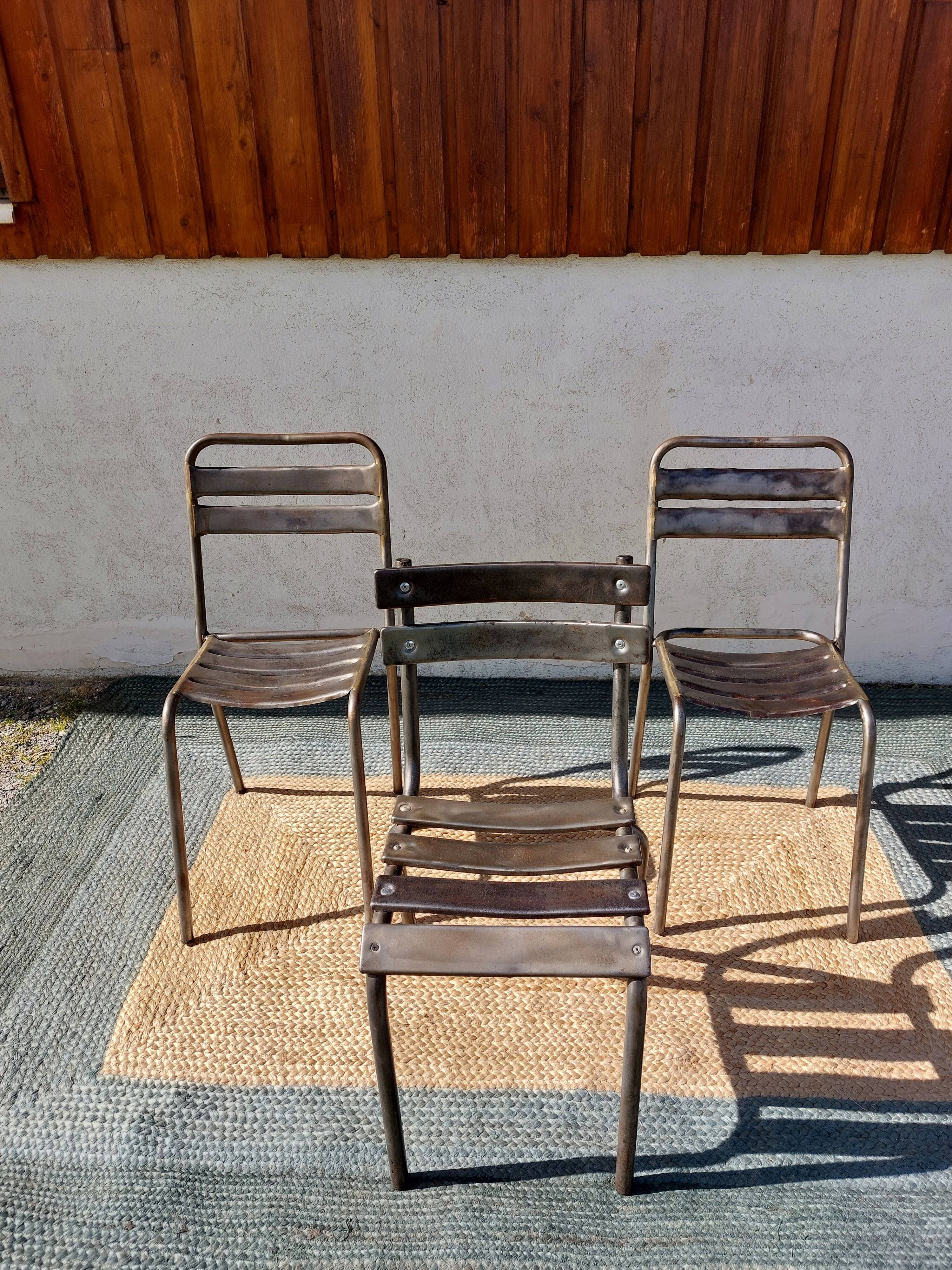 3 metal chairs, Tolix style