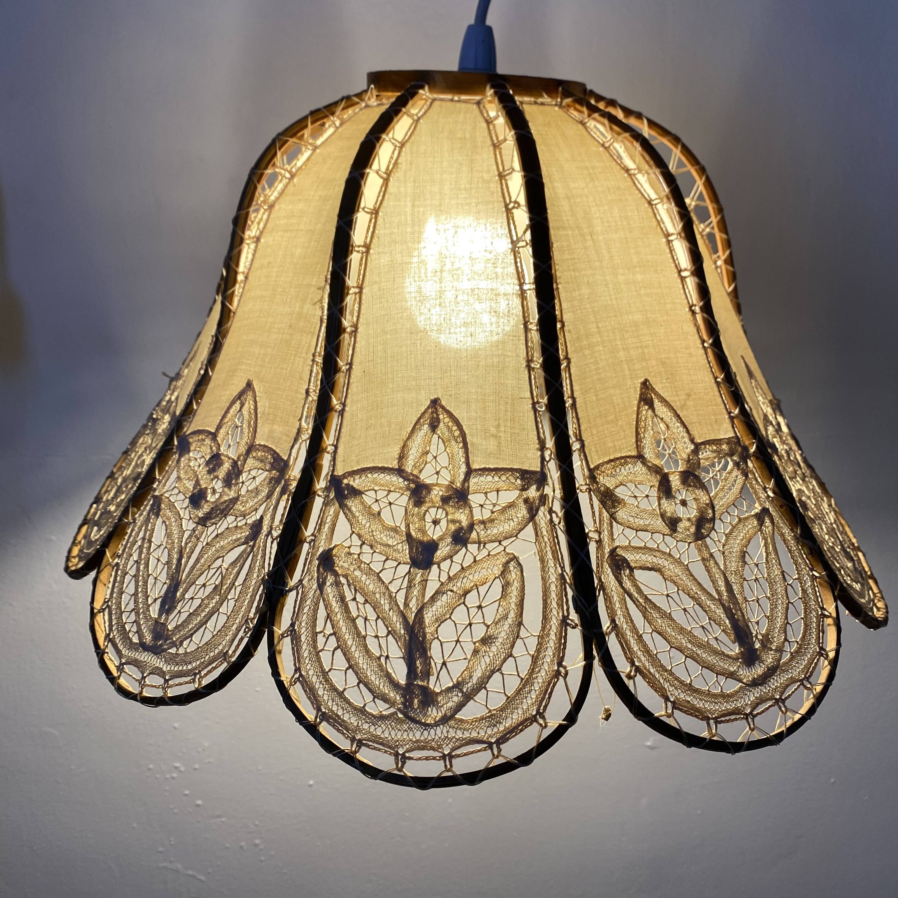 Antique hanging lampshade in rattan and openwork embroidered fabric