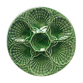 Green oyster plate in slurry