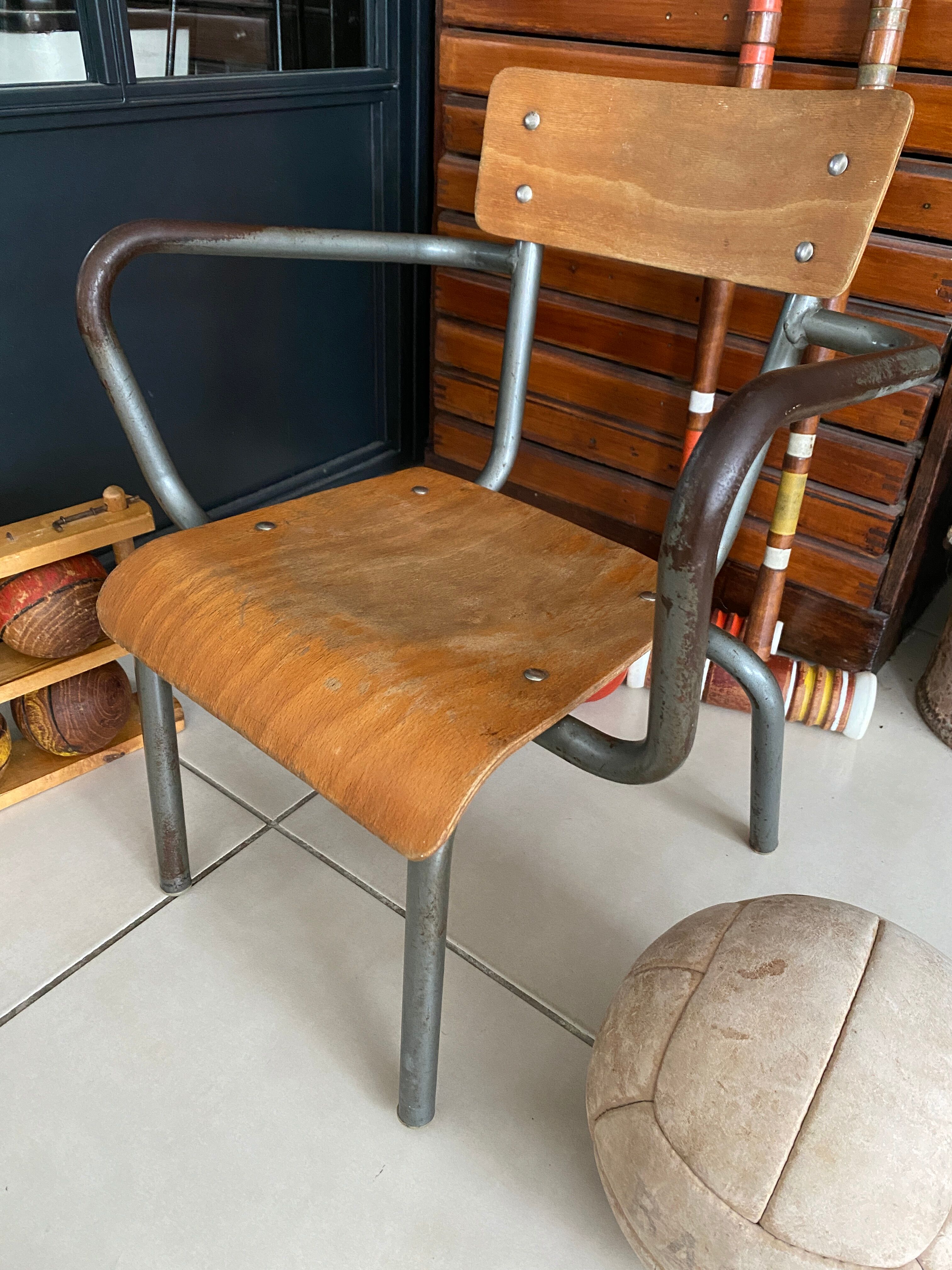 Old Mullca school chair with armrests