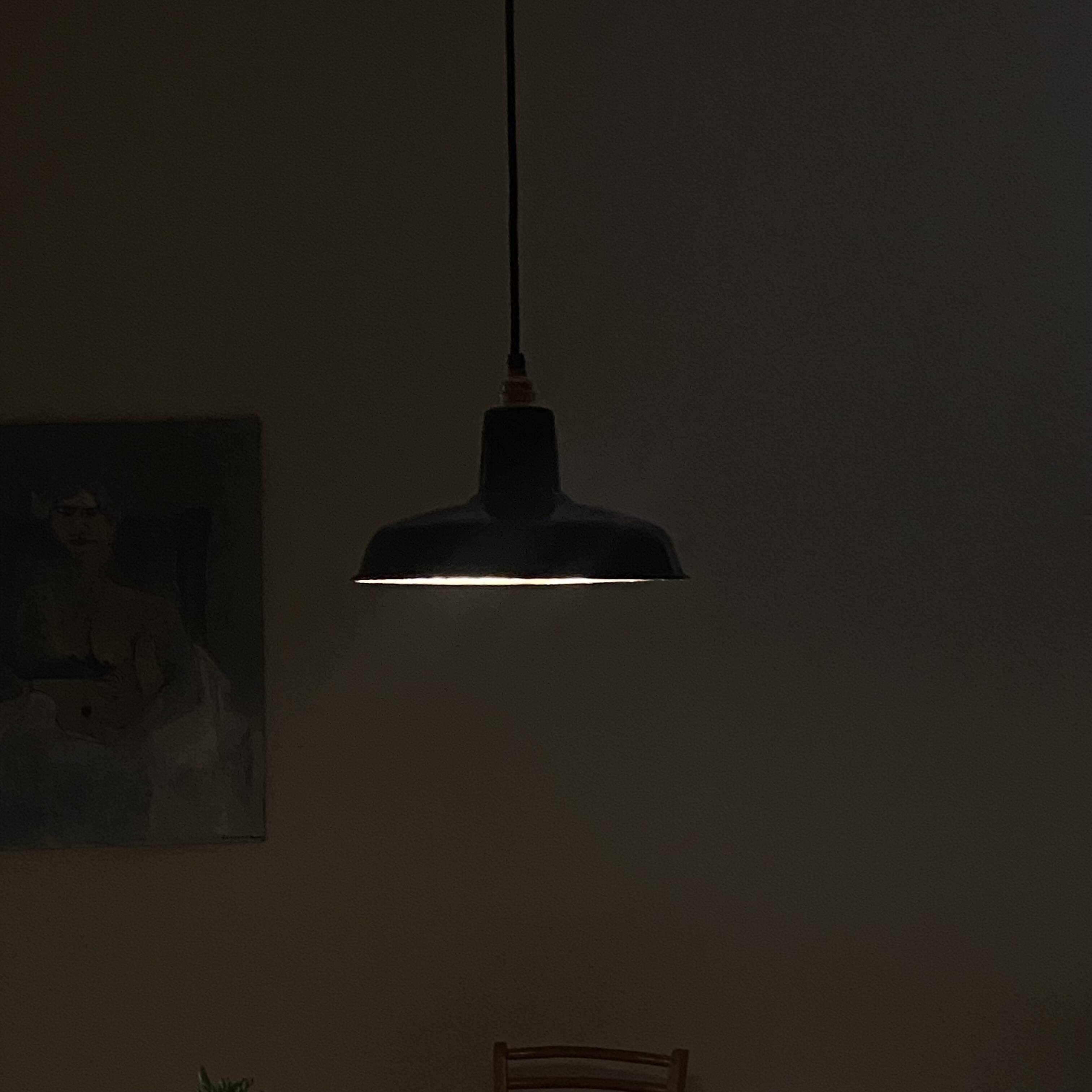 Suspension antique lampshade in black enamelled sheet metal.