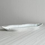 white porcelain plate in an unusual shape