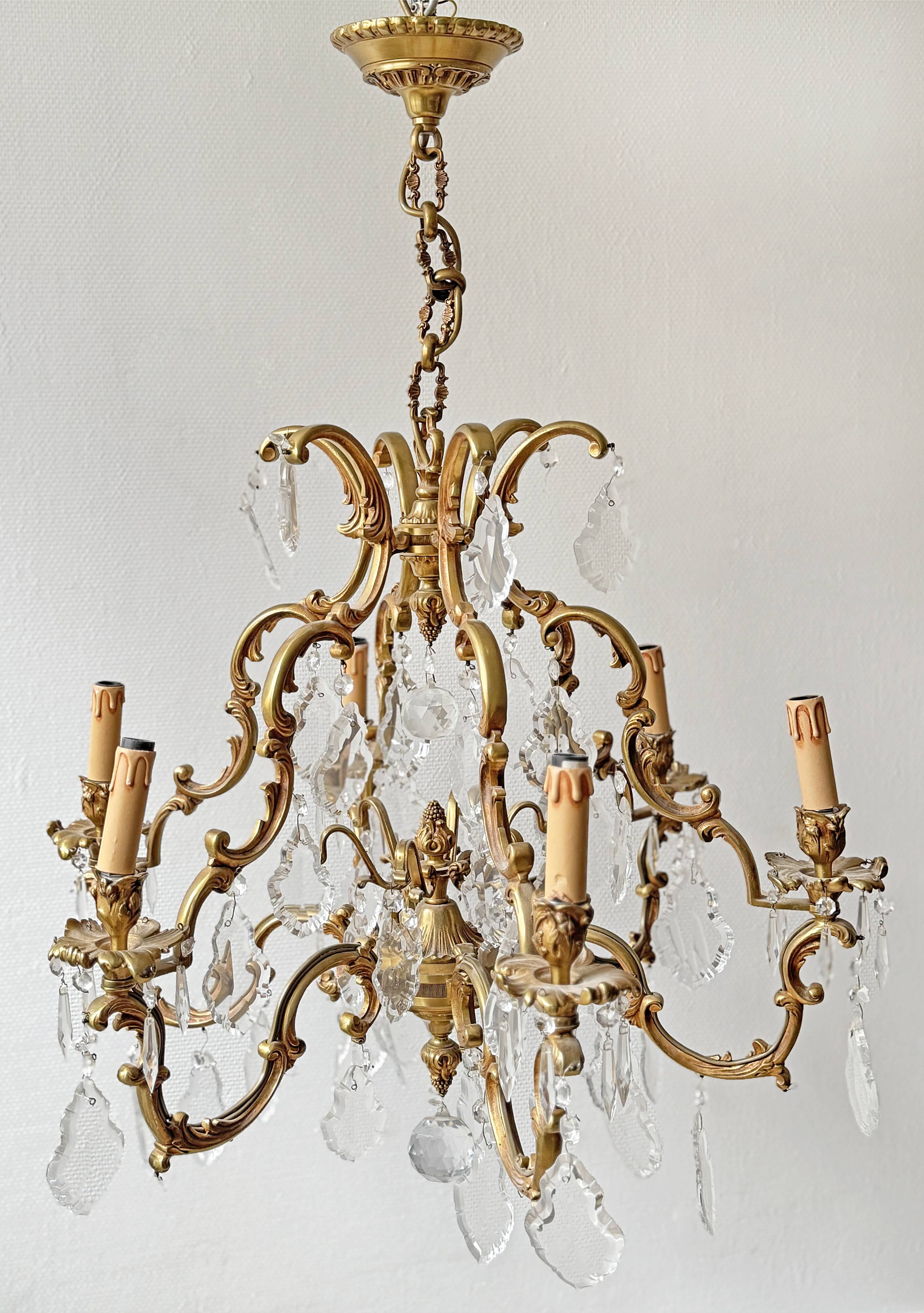 Louis XV style chandelier in gilded bronze with 6 light arms.
