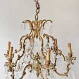 Louis XV style chandelier in gilded bronze with 6 light arms.