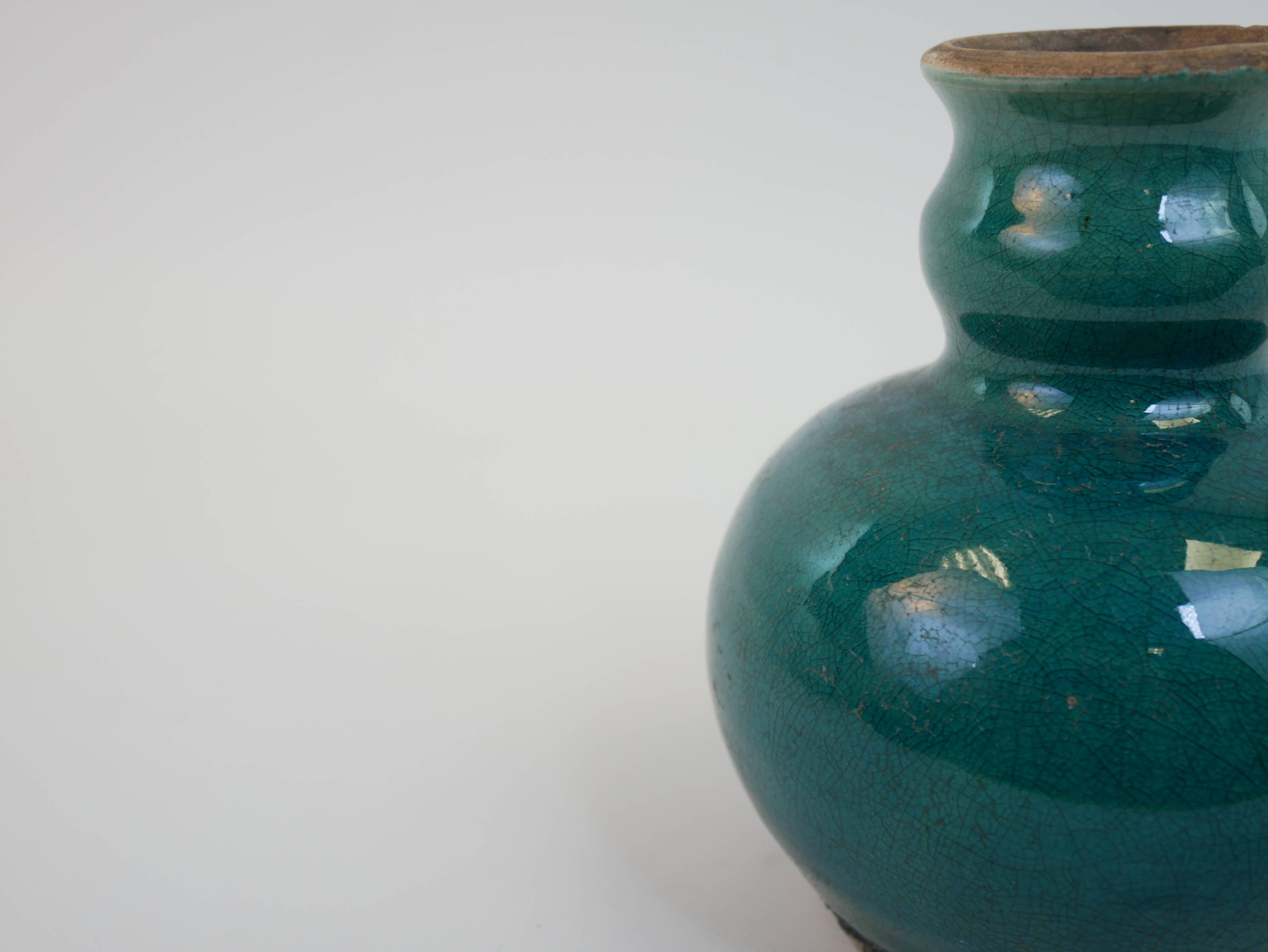 Small old blue ceramic vase