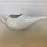 White porcelain sauceboat antique baby bottle