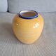 Ceramic vase in a round shape