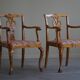 A pair of English Chippendale style armchairs in birch, 20th century, England.