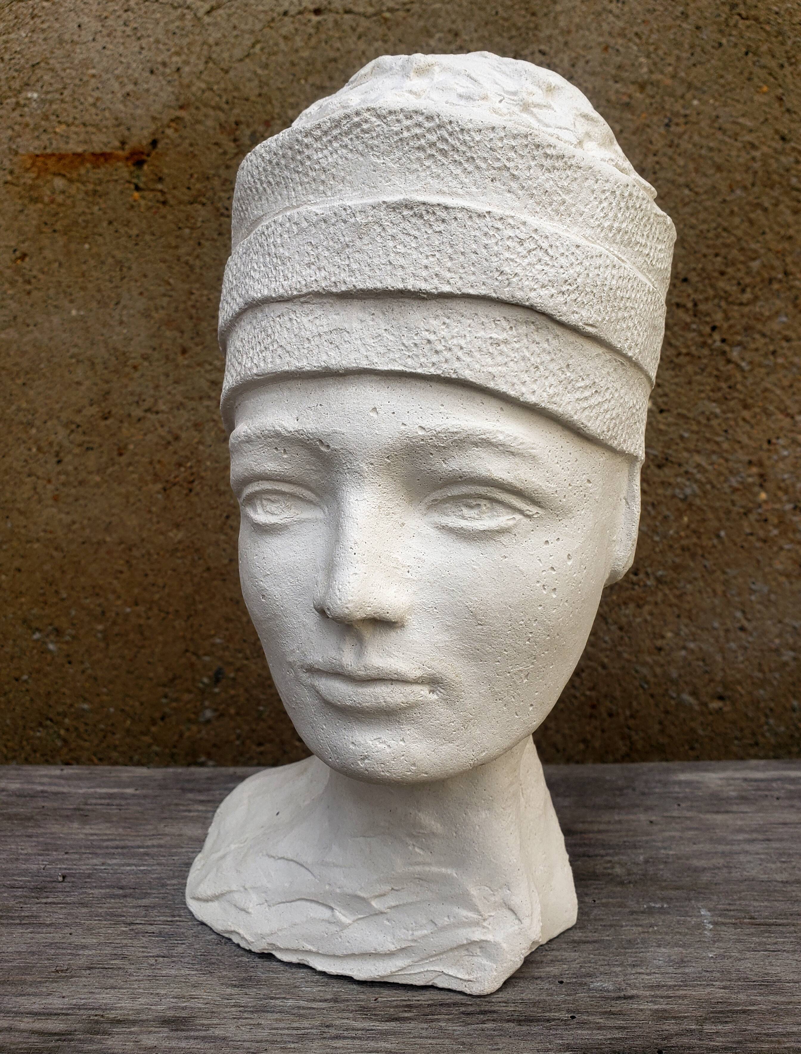 Young girl bust in plaster