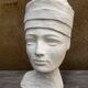 Young girl bust in plaster