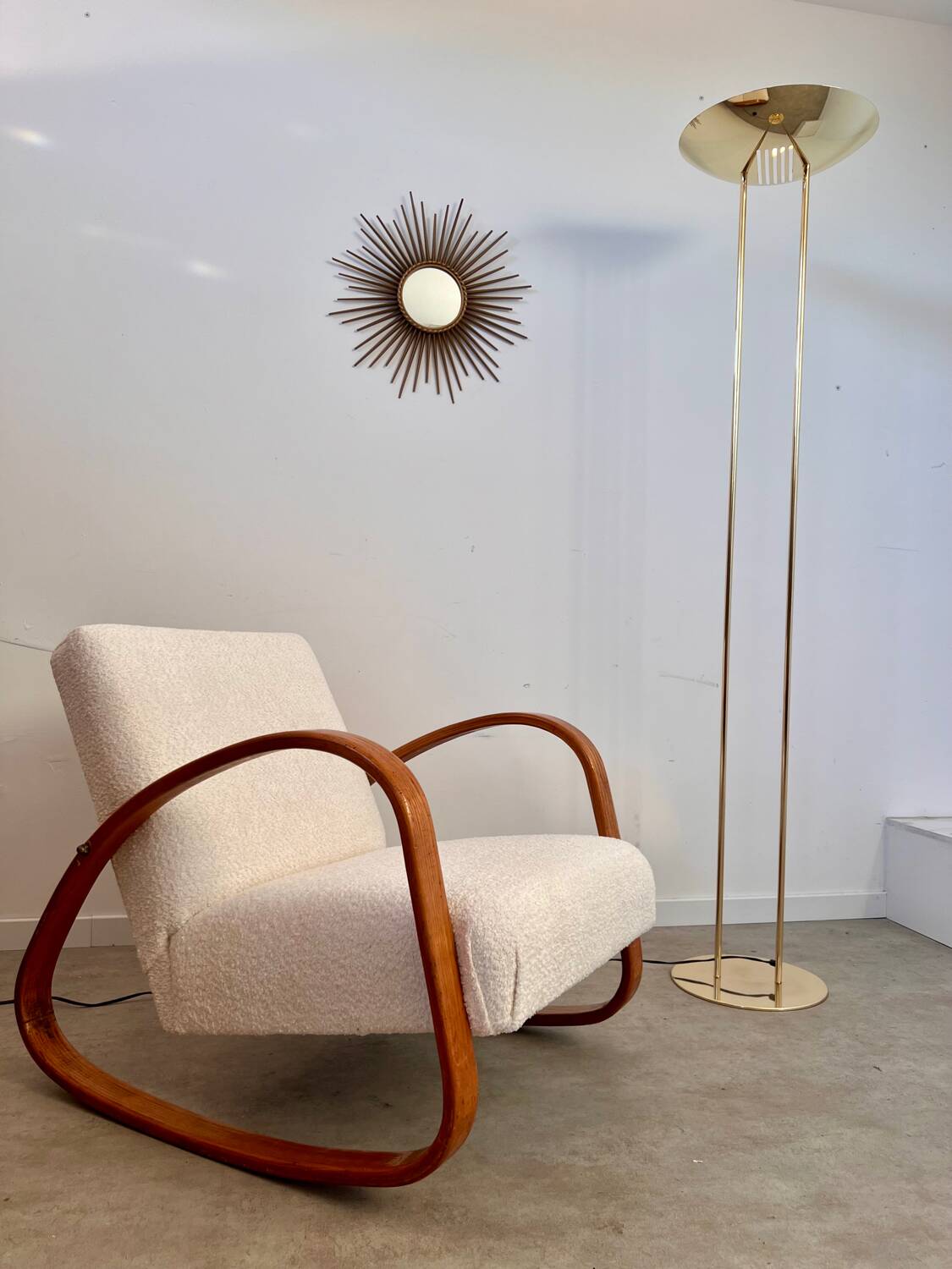 Old golden brass floor lamp with Italian design bulb from the 70s vintage