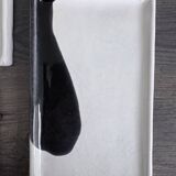 Lot of 4 rectangular glazed terracotta plates.