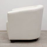 White faux leather armchair