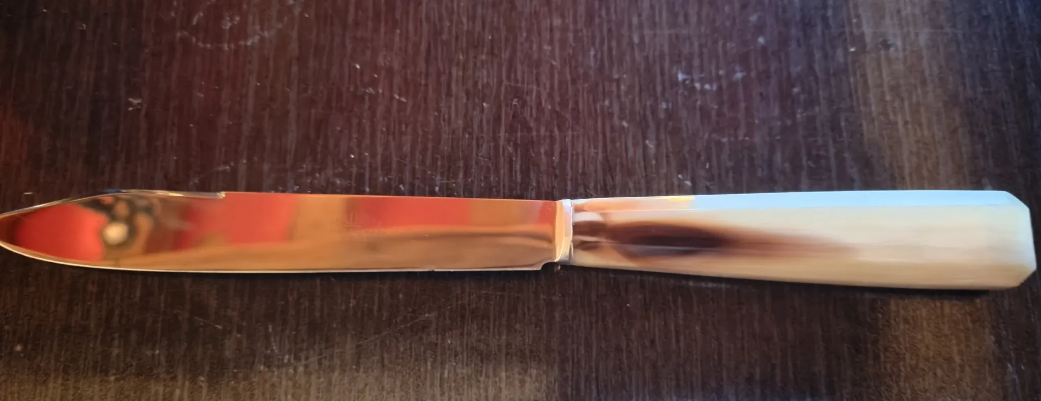 Set of 12 radium table knives in horn