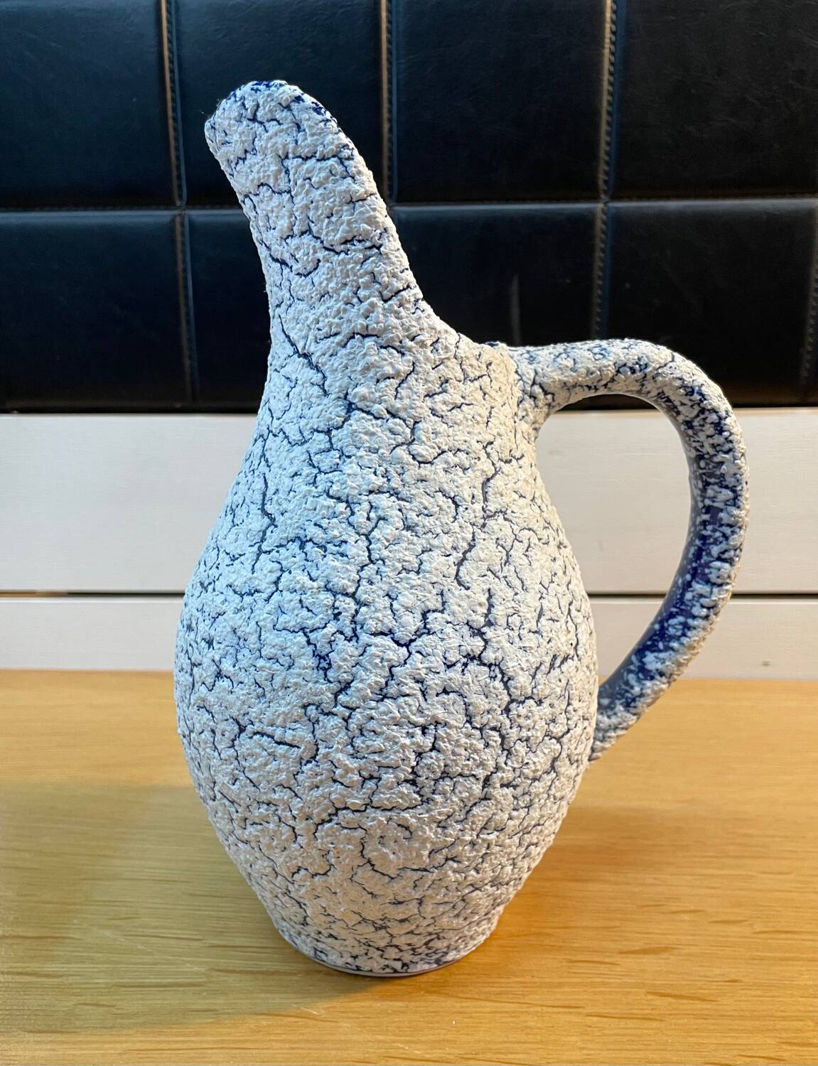 White and blue crisped ceramic pitcher