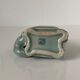Porcelain candle holder and celadon cover in the shape of an elephant