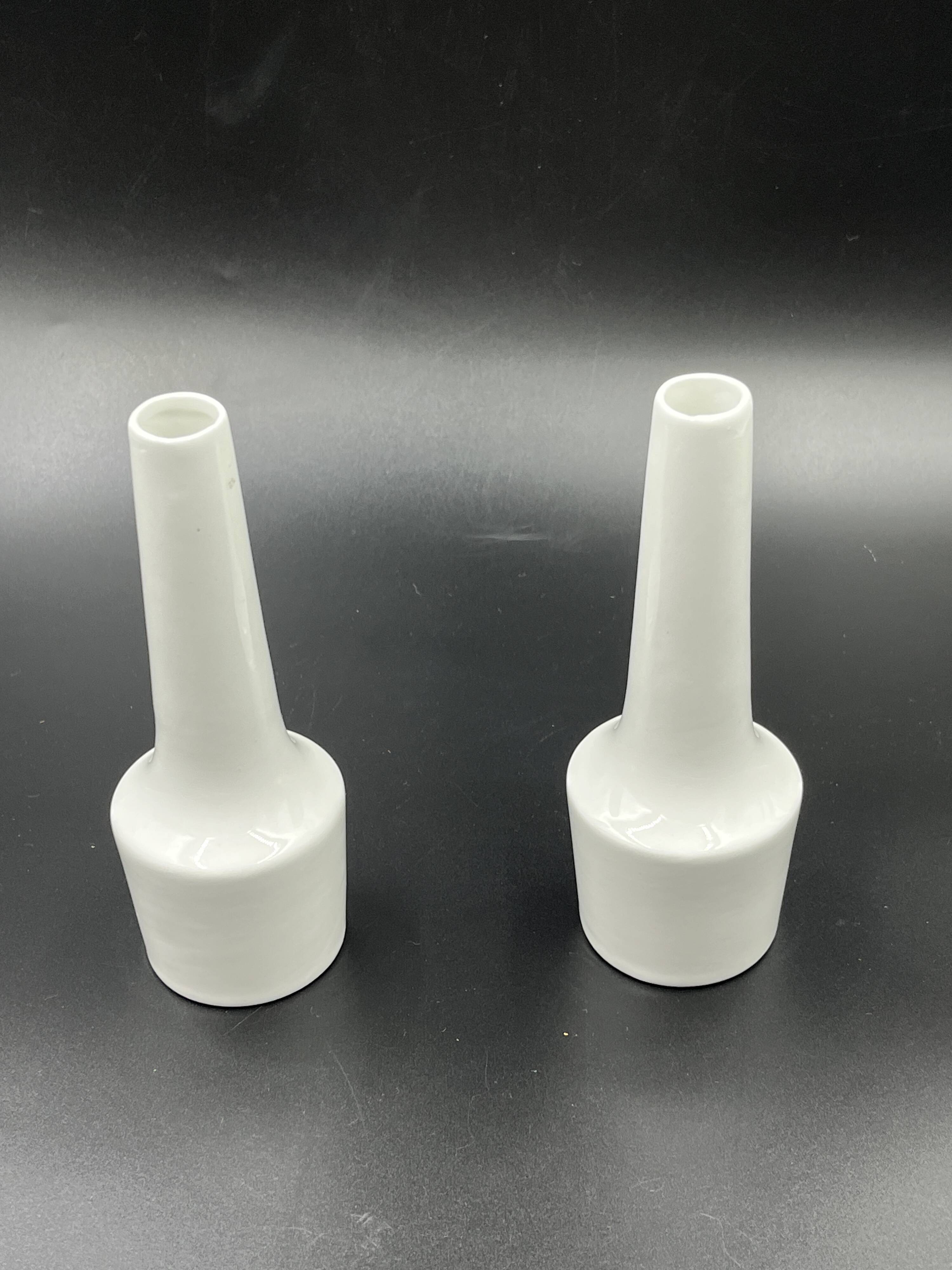 Pair of vintage white ceramic bud vases