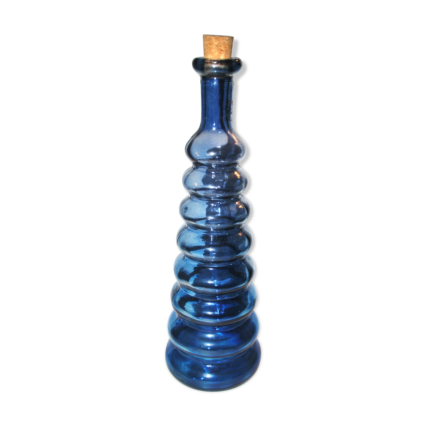 Vintage bottle in moulded glass