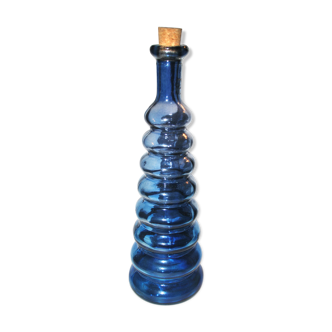 Vintage bottle in moulded glass