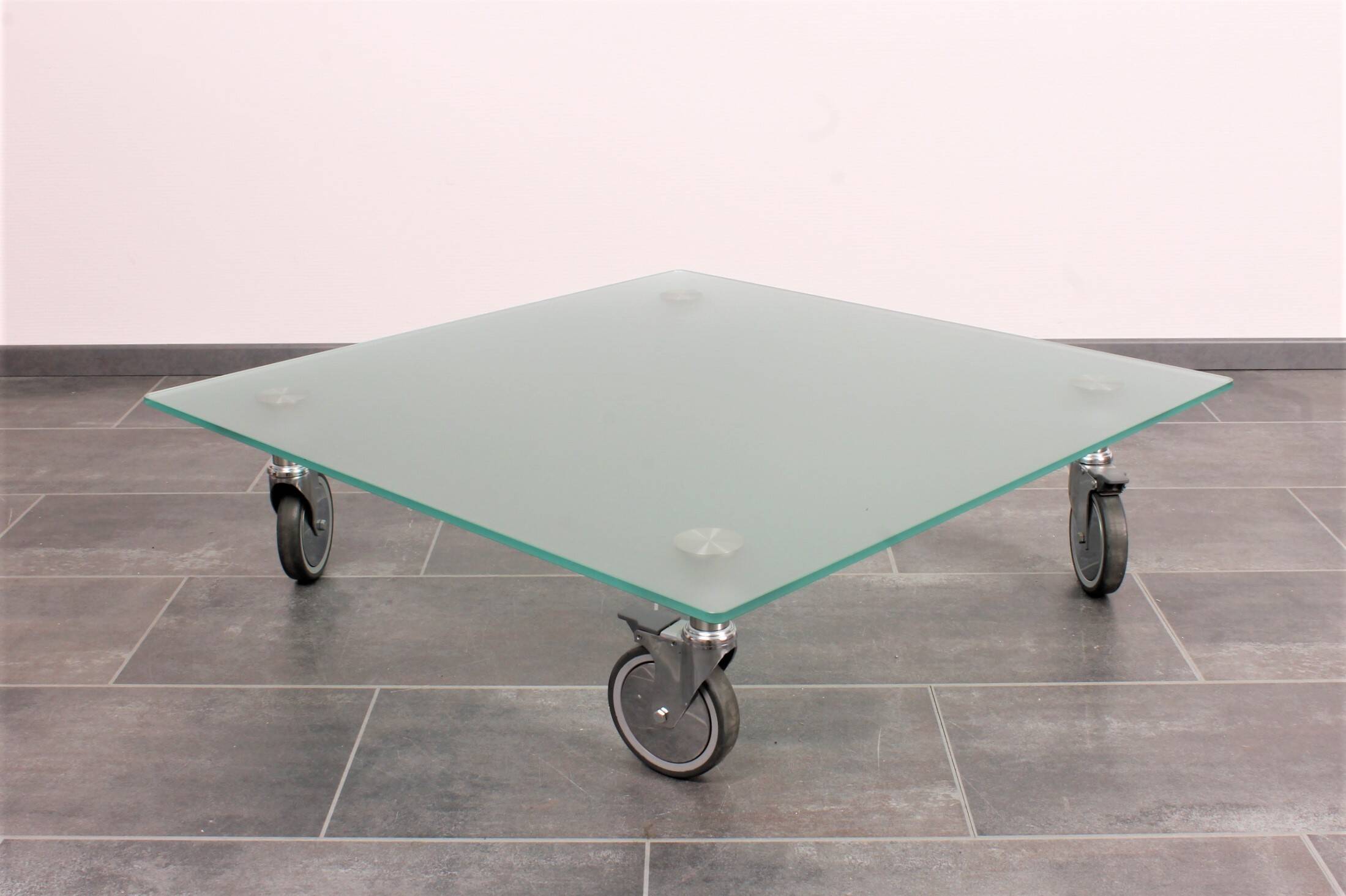 Wheeled glass coffee table