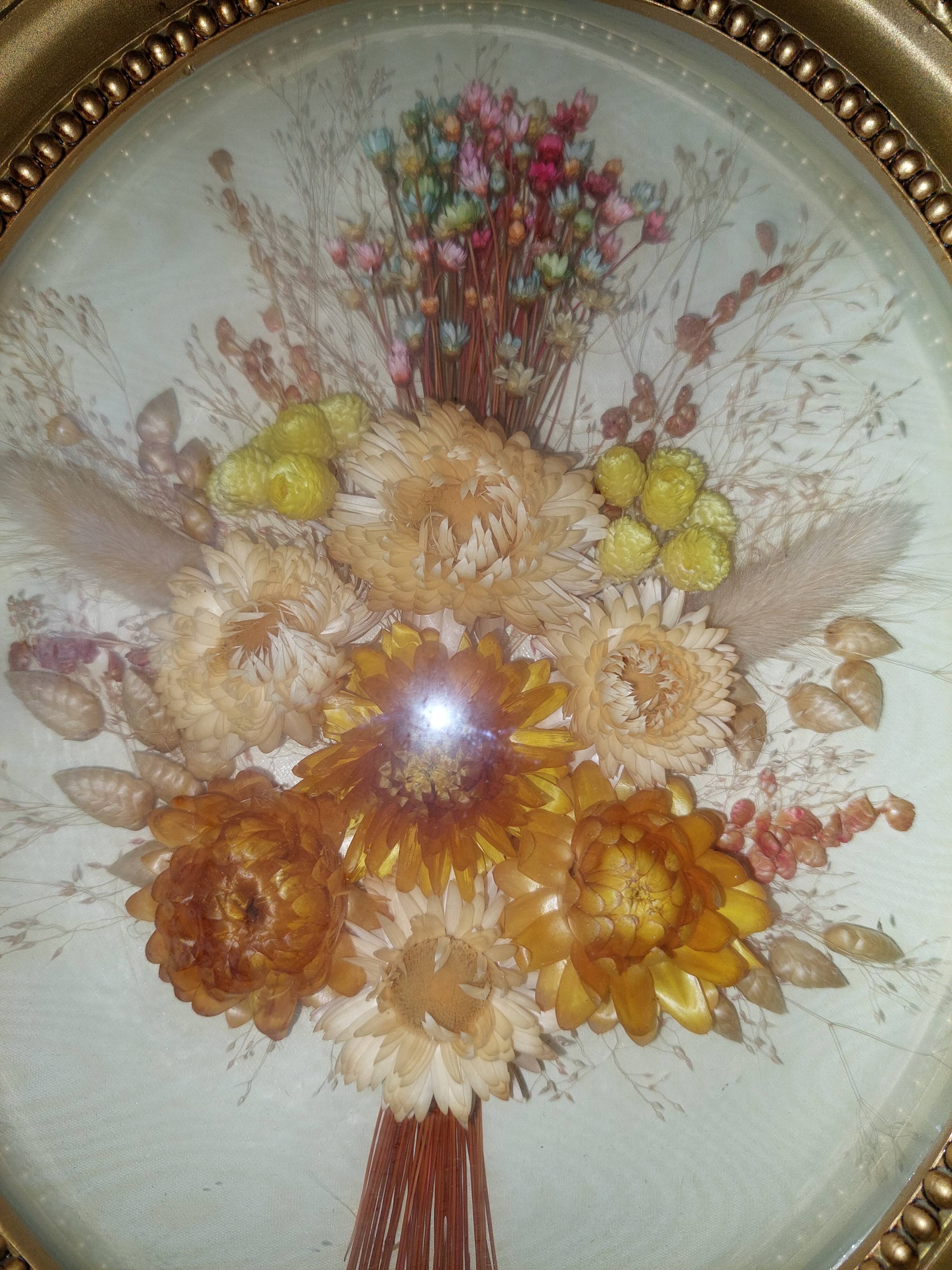 Oval frame domed dried flowers occasion