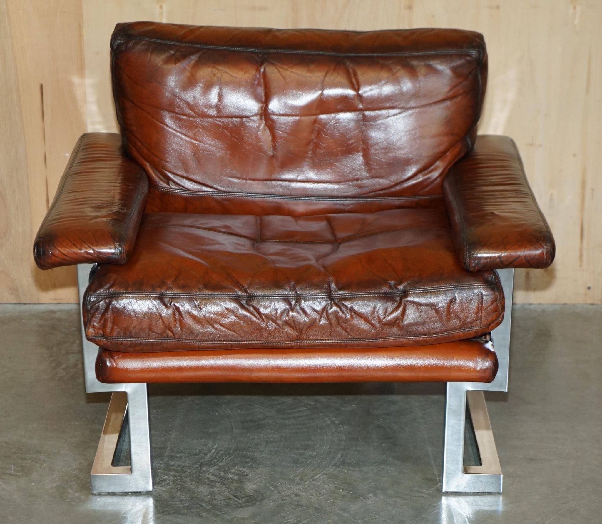 Restored suite Tim Bates for Pieff Mandarin leather chrome hardwood.