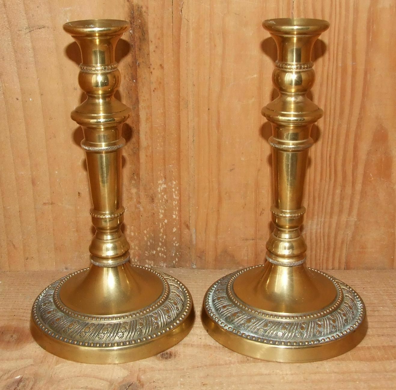 Pair of empire-style candlesticks or gilded bronze restoration