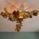 Large brutalist brass chandelier with floral decoration, 1970s.