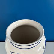 Vintage white and blue ceramic vase with floral pattern