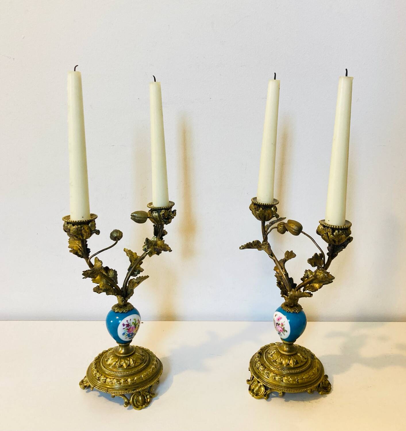 19th century candle holders in gilded bronze and porcelain