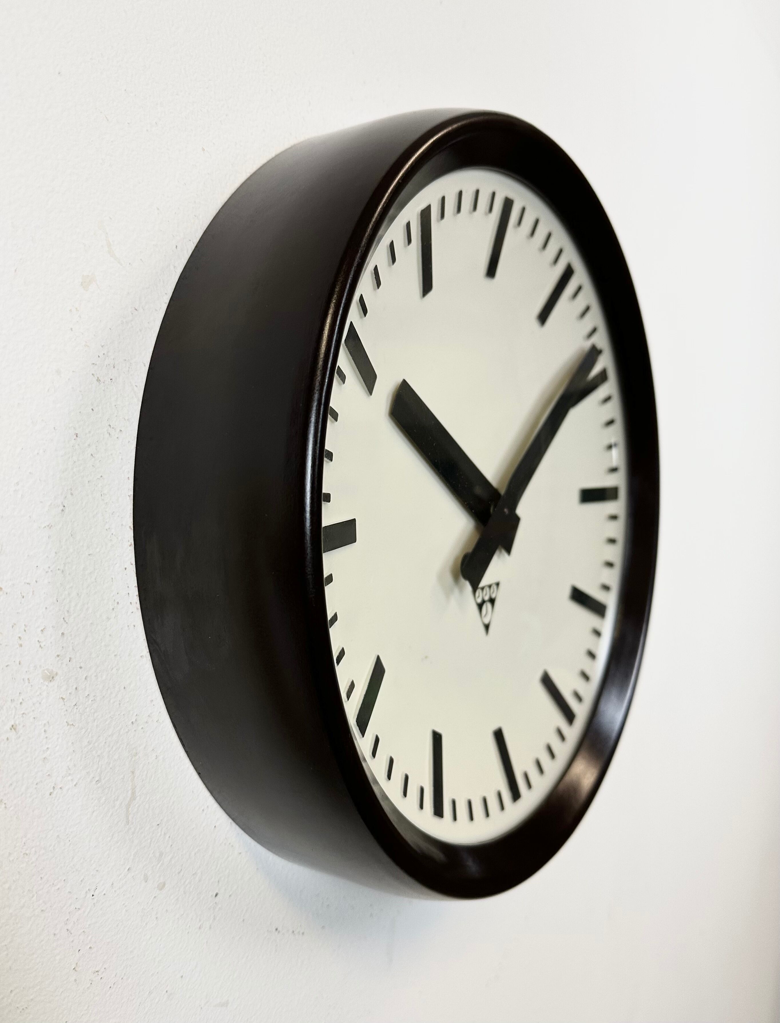 Industrial bakelite factory wall clock from Pragotron, 1960s