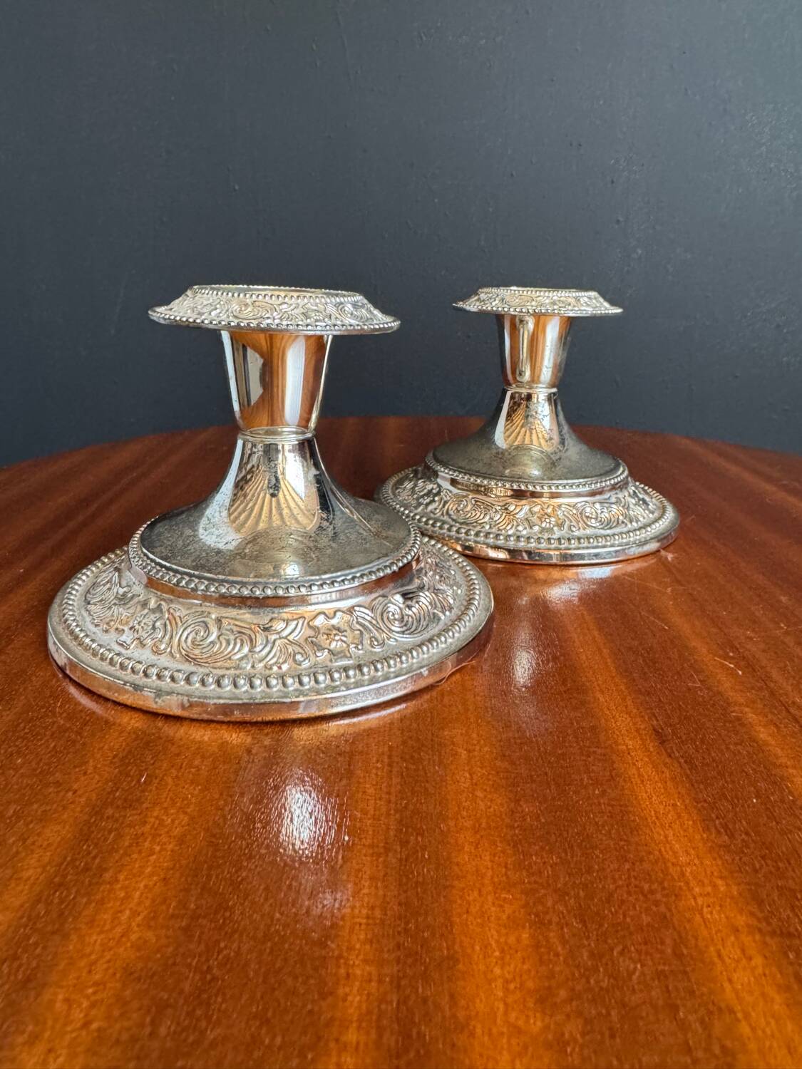 Silver-plated metal candlesticks from the 1980s.