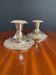 Silver-plated metal candlesticks from the 1980s.