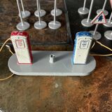 Set of 12 panels and a station, toy dinky toys