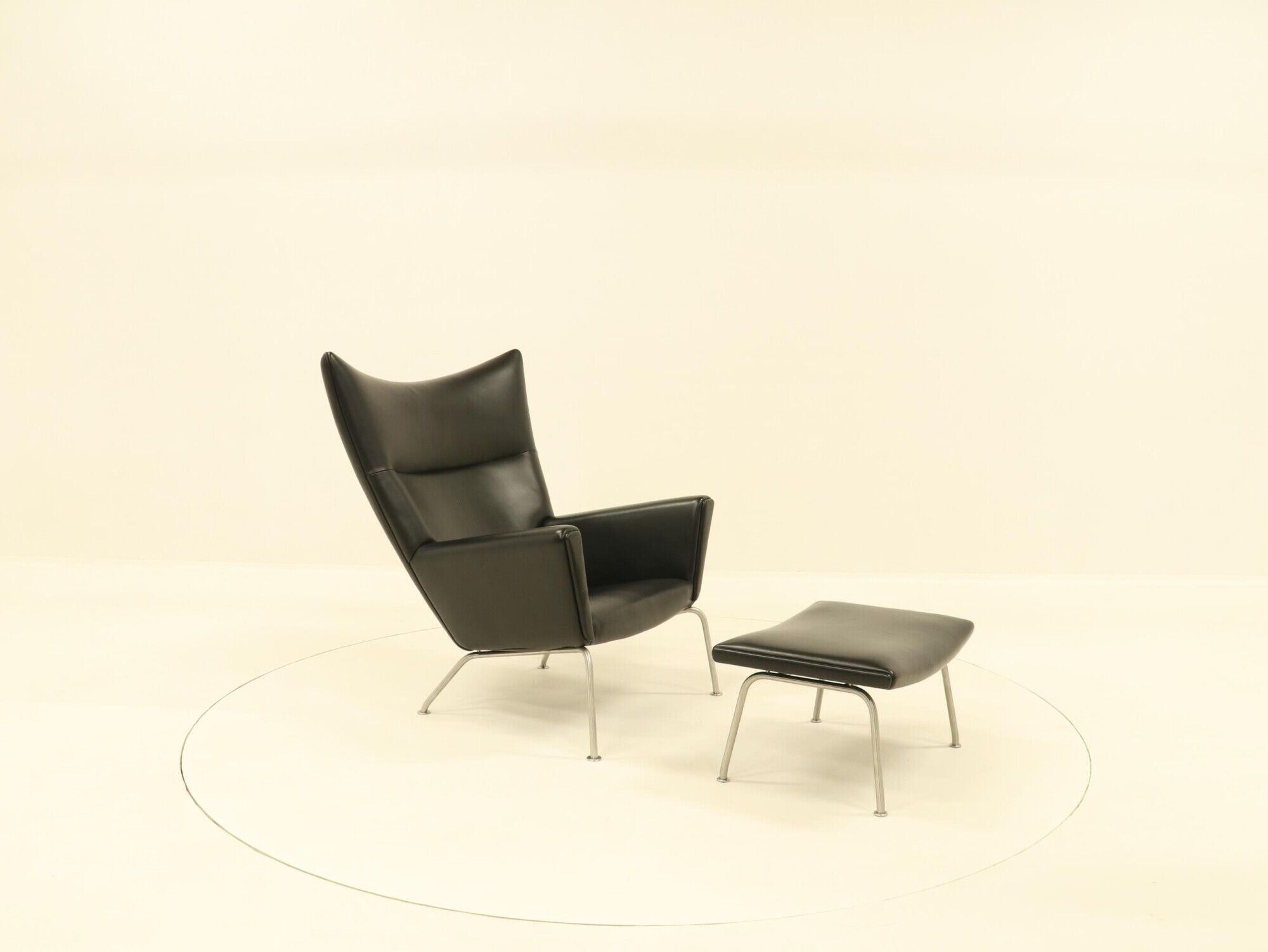 Wing chair & matching ottoman – CH445 & CH446 – by Hans Wegner