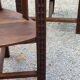 Set of three brutalist tripod armchairs in carved solid oak